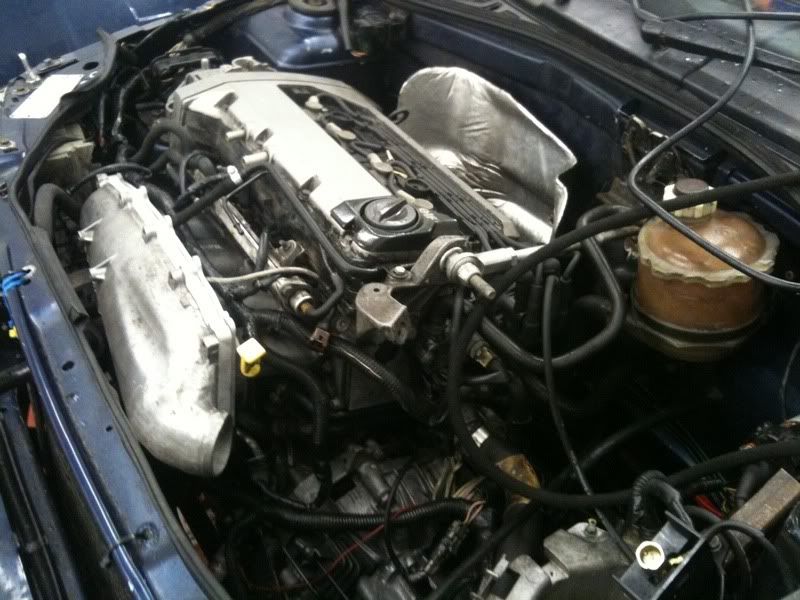 And now look at this picture of my other clio The honda engine cam cover is