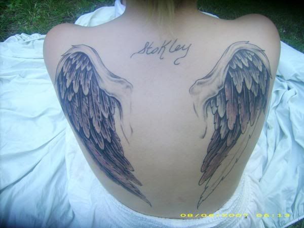 angel halo tattoo. Angel head with halo and wings