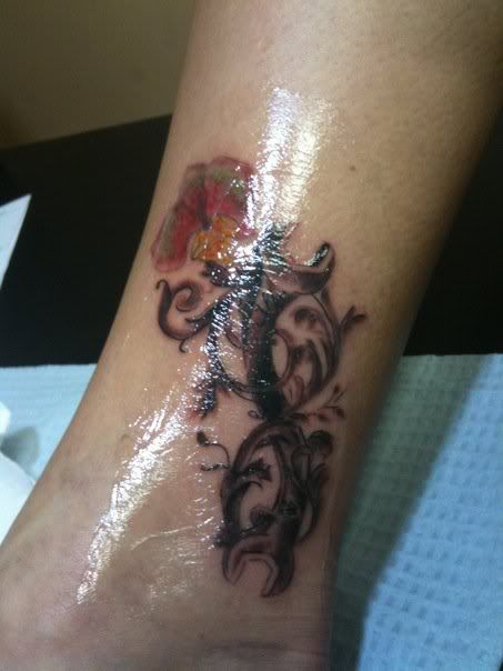  duplicated.. the filigree matches another tattoo and gotta ad something 