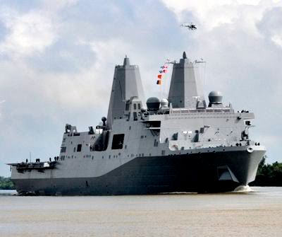 Partly made from recycled steel salvaged from ground zero, the USS New York steams toward the Big Apple for its commissioning