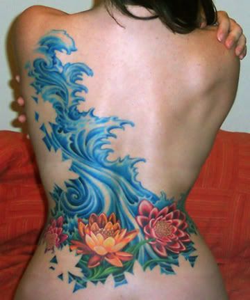 Wings of a butterfly tattooed on girl's back. girls back tattoos