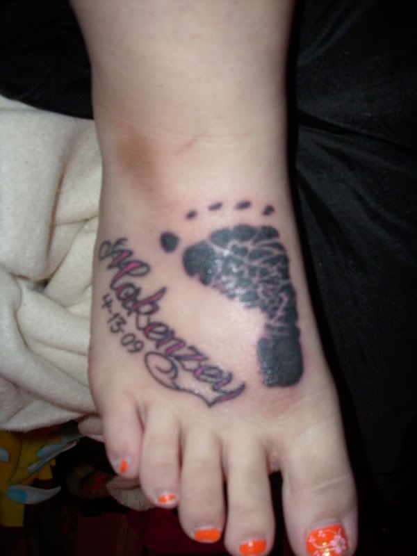Mitzi [my tattoo for my daughter ]. from my album: Miscellaneous · my tattoo 