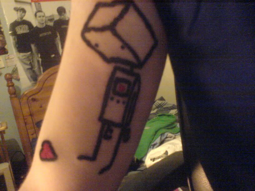 Excuse the old, grainy camera phone pic, but I have this tattoo.