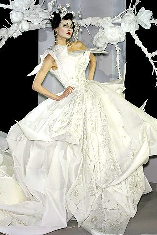 john galliano dior designs. With designs by John Galliano,