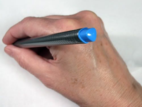 Trangular Tip The triangluar shape was comfortable for me at first, but after extended use, a corner started to dig into my finger. This may not be a problem for most people, but it was for me.