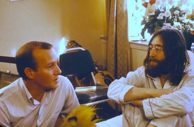 John Lennon and Tommy Smothers