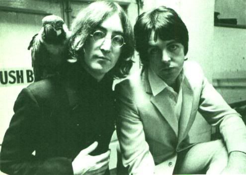John Lennon Paul McCartney and the spirit of Brian Epstein (who was born on Talk Like A Pirate Day; hence, the parrot)
