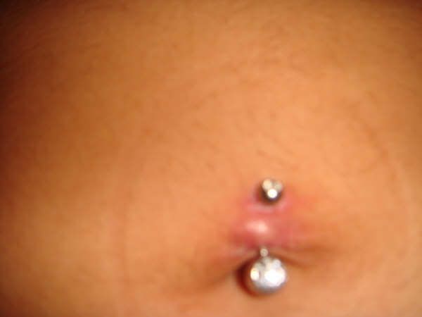 Does anyone with a navel piercing (or without haha) have any idea what ...